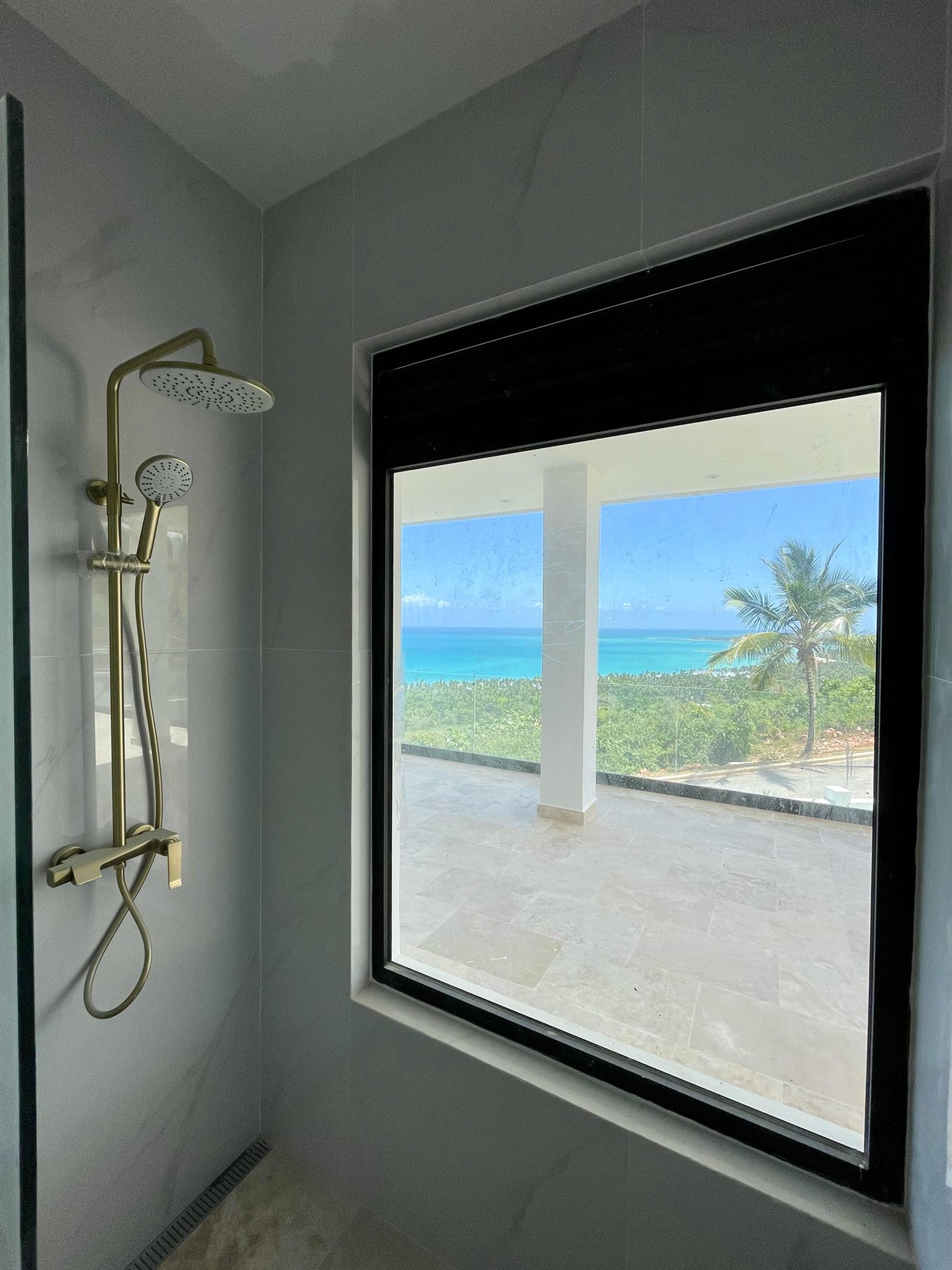 Shower fixtures with ocean view, Dominican Republic villa, 2025